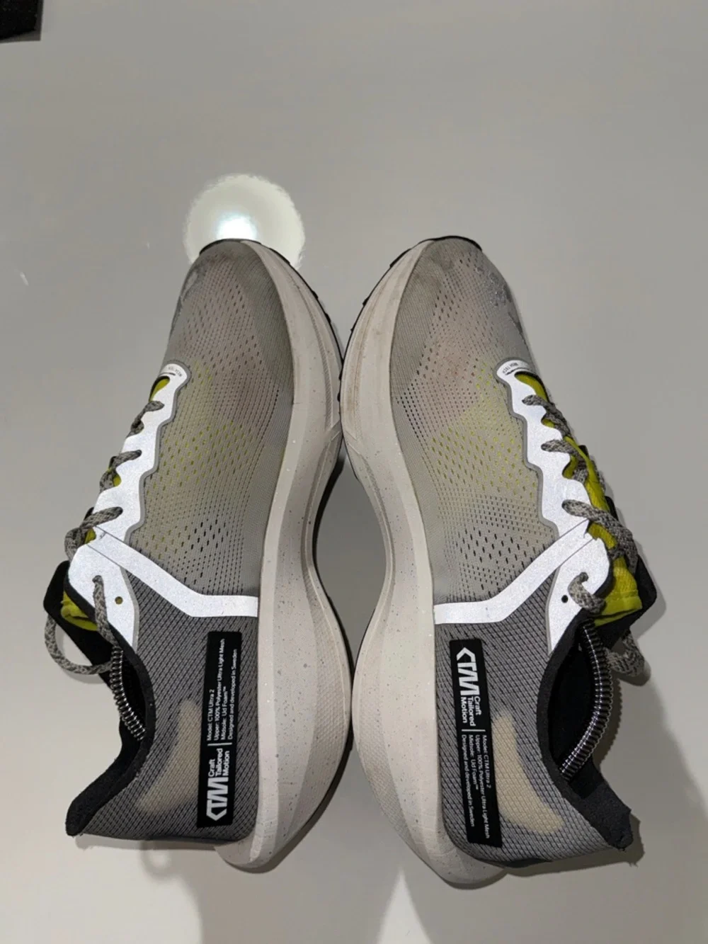 Craft Lightweight Neutral Gray Running Shoes with Bright Yellow Accents